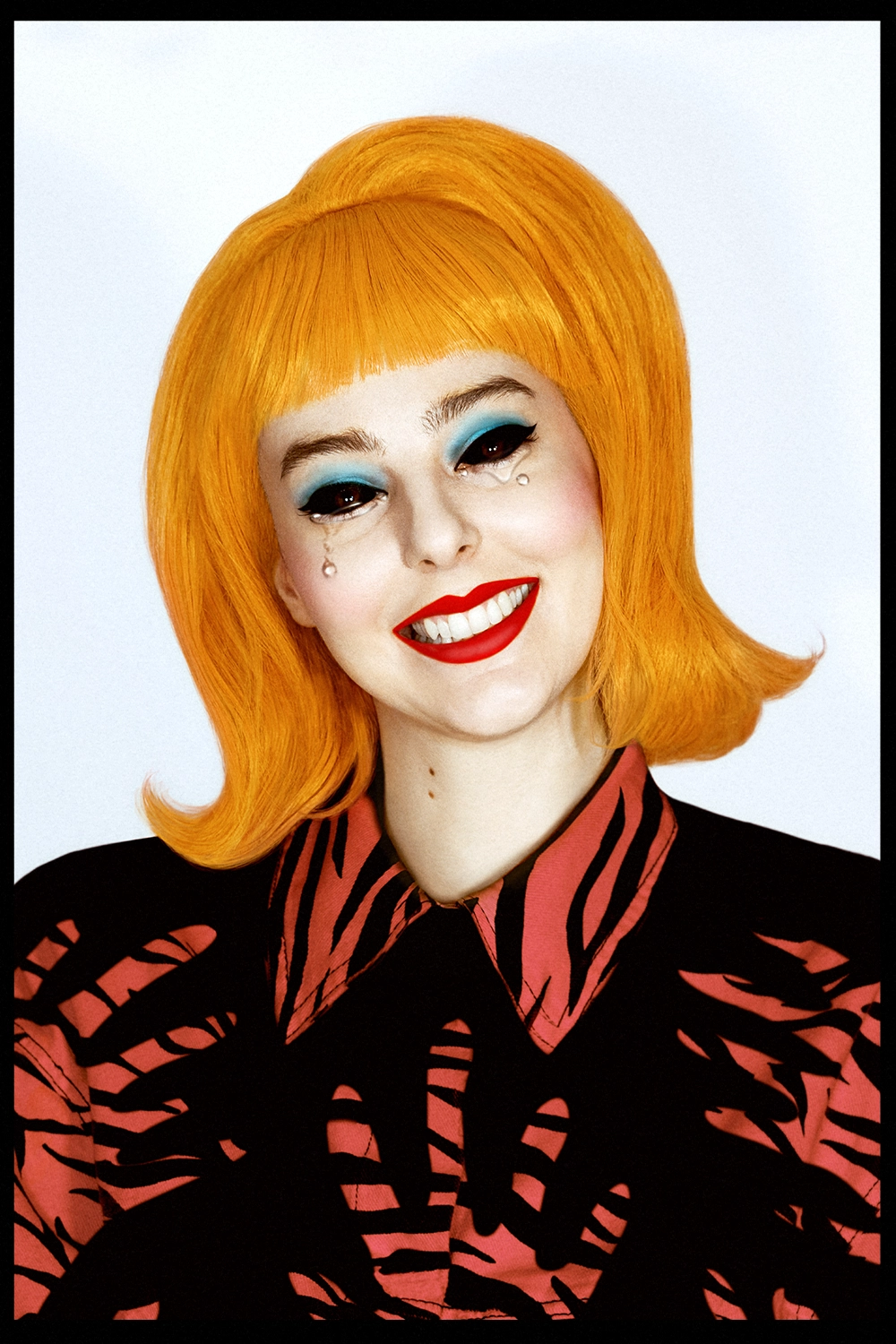 Portrait by Valeria Vavoom illustrating the inner turmoil of appearing socially acceptable while being emotionally devastated. The image captures the artist smiling and crying simultaneously.